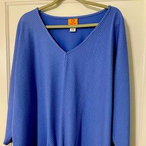 Blue vneck top with three quarters sleeves and tie in front. Ruby red size 1X